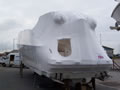 shrink wrapped airplane en route to the Paris air show