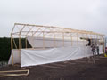 a simple containment tent made with shrink wrapping